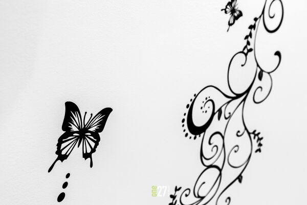 Butterfly and swirls on the wall architectural photography, design details