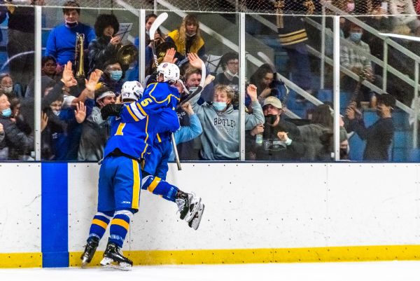 Verical leap of joy in celebration of a hockey goal