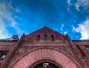 The front arch at the Acton Memorial Library 