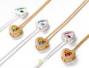 silver and gold birthstone necklace marketing photo